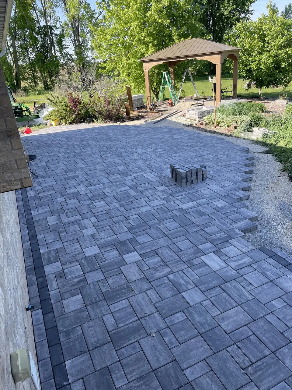 Paver patio with a gazebo